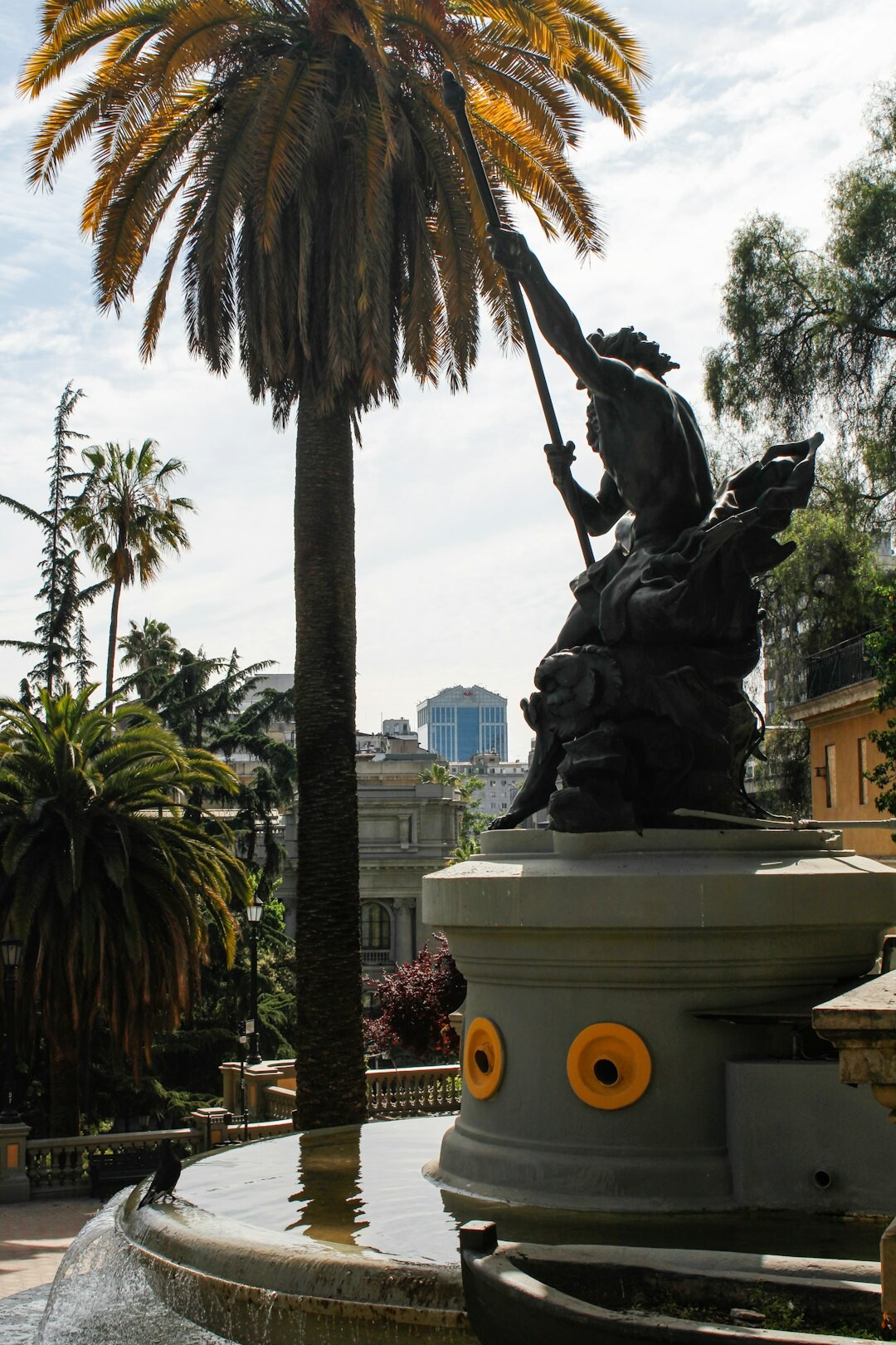 Historic central plaza with cathedral and palm trees in a Chilean city